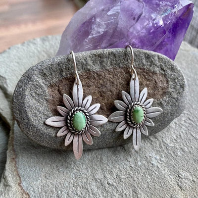Zoraida | Elegant sterling silver lotus earrings with sparkling green stones
