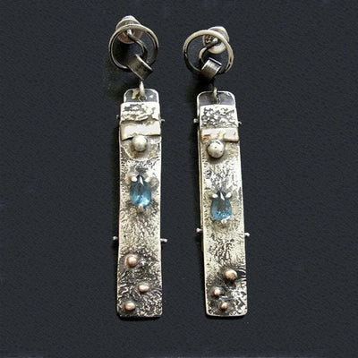 Fabiola | Elegant handmade earrings with beautiful blue stones.
