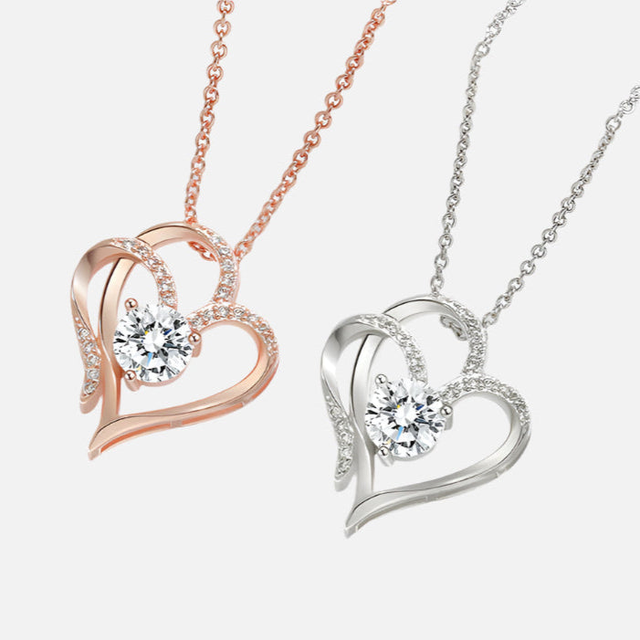 Elena | Necklace with a charming double heart and sparkling zircons.