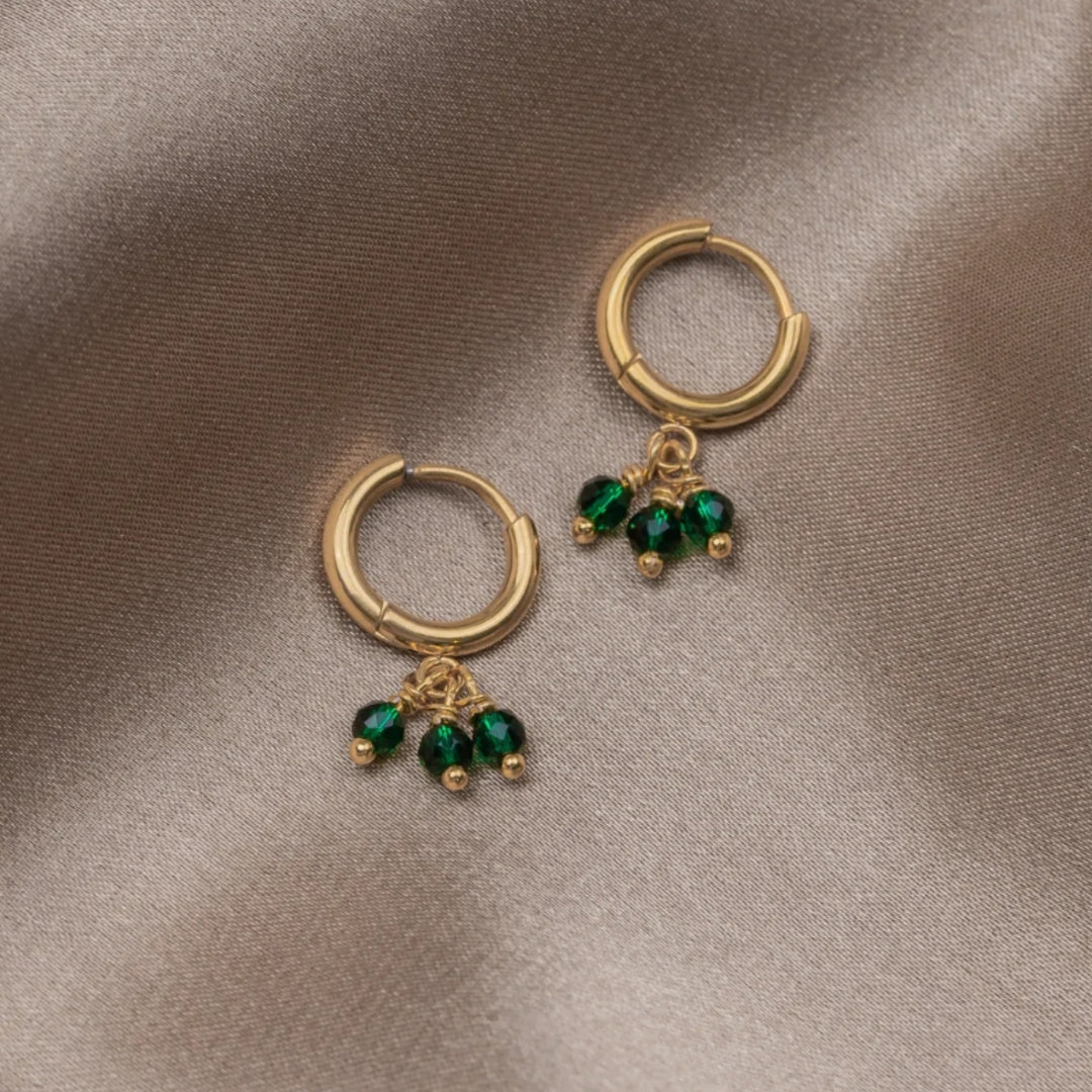 Tamara | Elegant single earrings with sparkling triple green zirconia in a sophisticated gold design