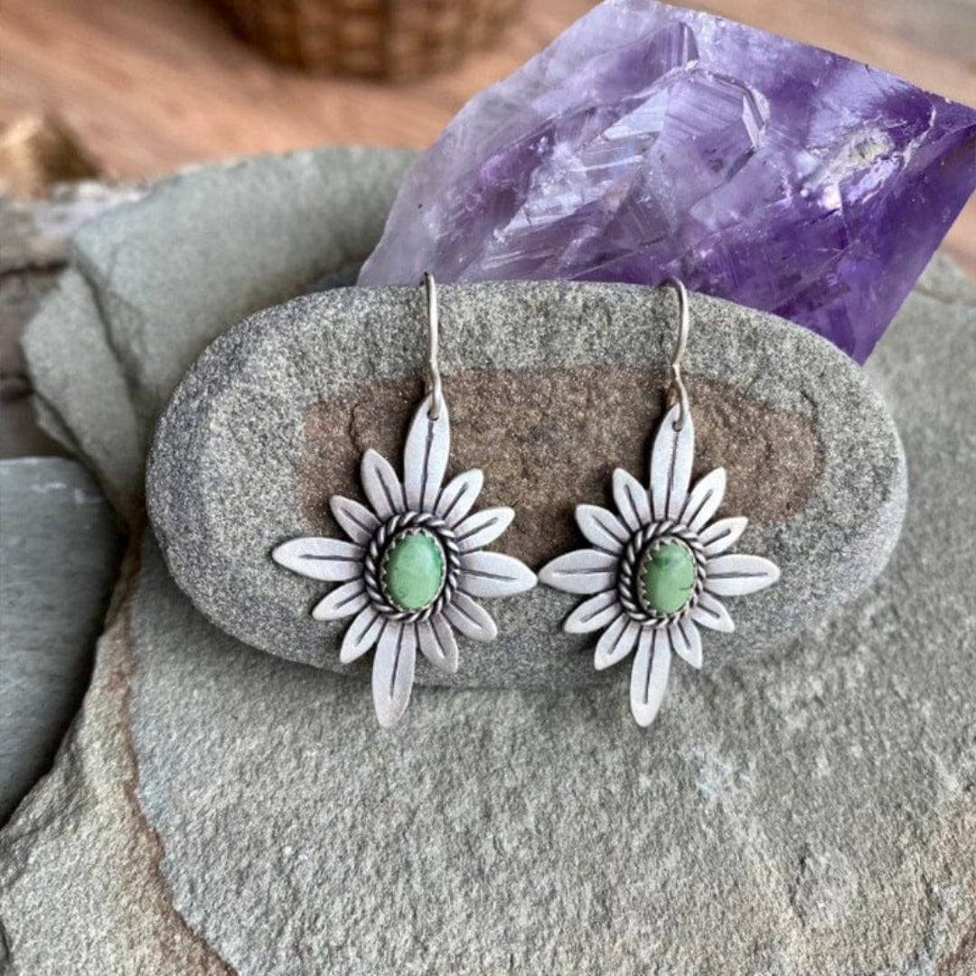 Zoraida | Elegant sterling silver lotus earrings with sparkling green stones