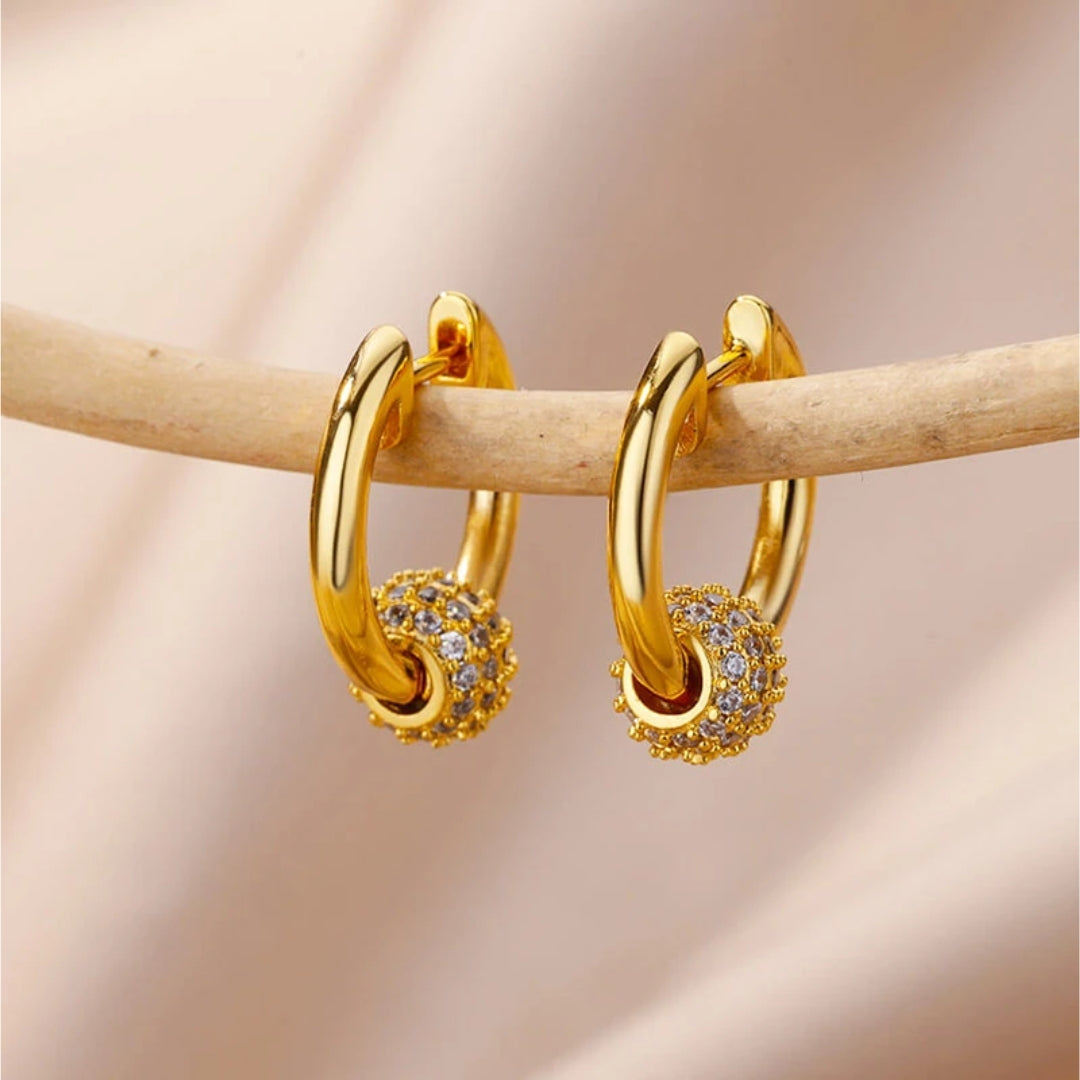 Karen | Elegant gold earrings with radiant spheres