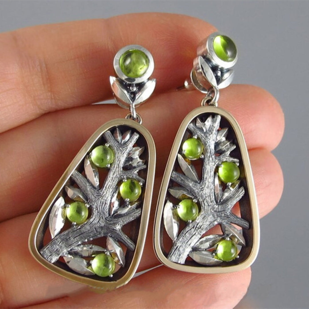 Yolaina | Elegant silver jewelry with bright green crystals