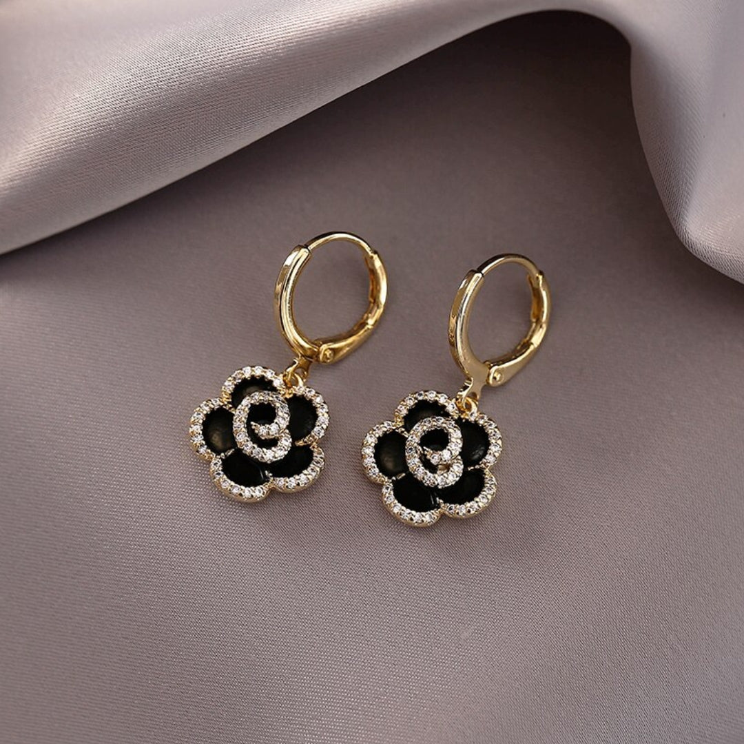 Brigida | Elegant Lotus earrings in black: stylish accessories for any occasion.