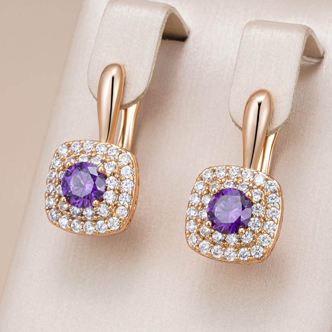 Tamara | Glamorous gold earrings with sparkling purple glitter