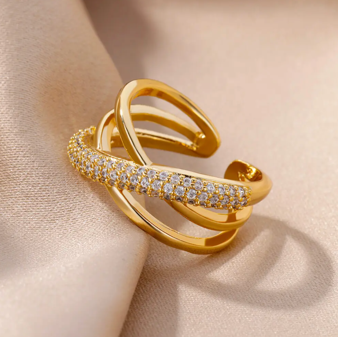 Janeth | Elegant 18-carat gold-plated ring with artfully intertwined paths and sparkling zirconias