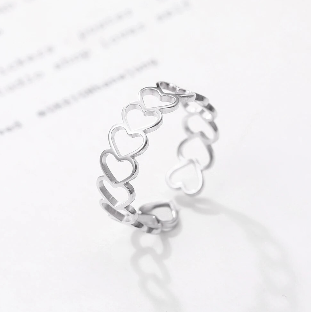 Xandra | Playful 925 sterling silver ring with heart motifs
