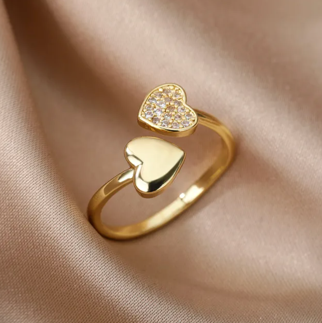 Consuelo | Elegant, adjustable ring with two loving hearts and sparkling zirconias, 18-carat gold-plated