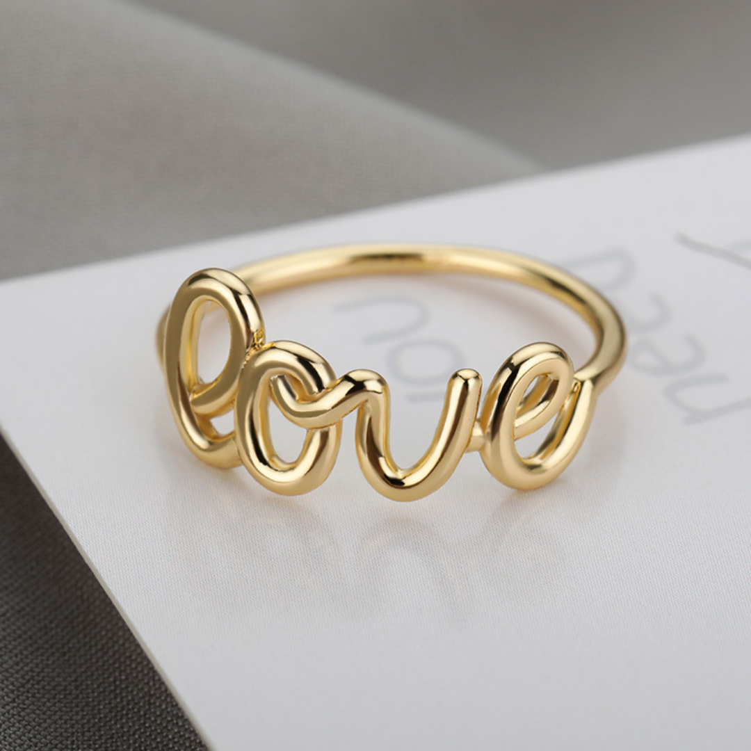 Nerea | Elegant LOVE ring with gold finish