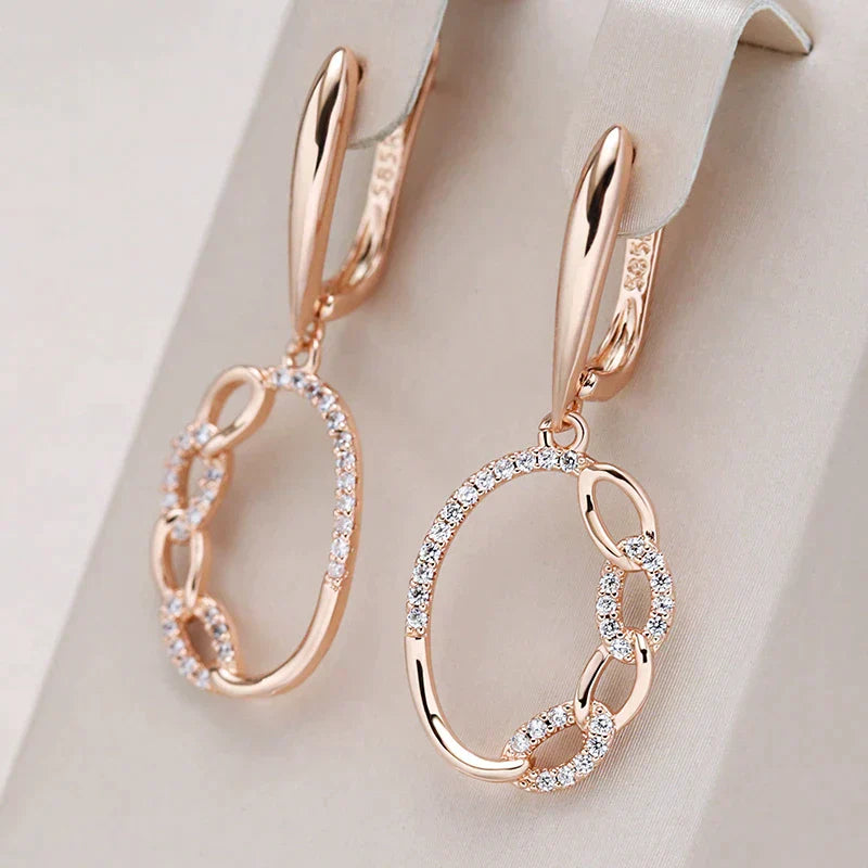 Irene | Radiant gold zirconia earrings for a touch of elegance