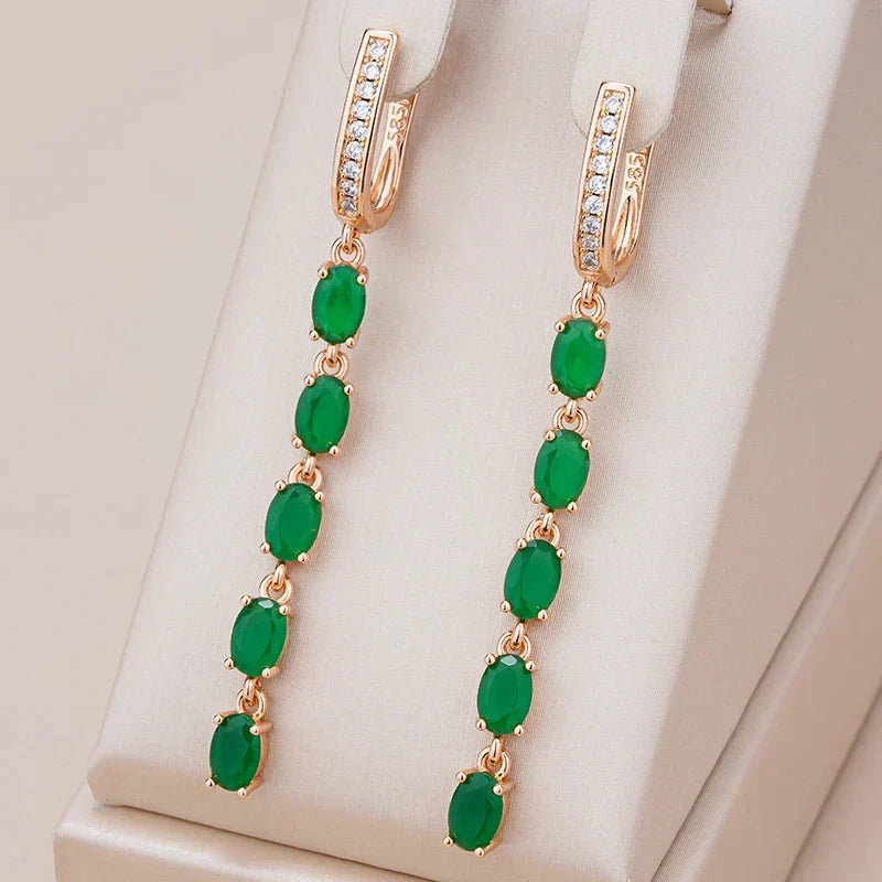 Judith | Elegant dangling earrings with radiant green crystal