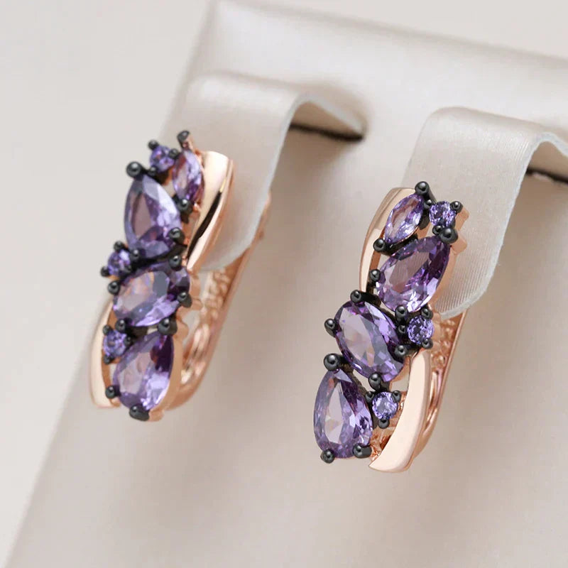 Marcia | Fascinating golden earrings with sparkling small purple crystal