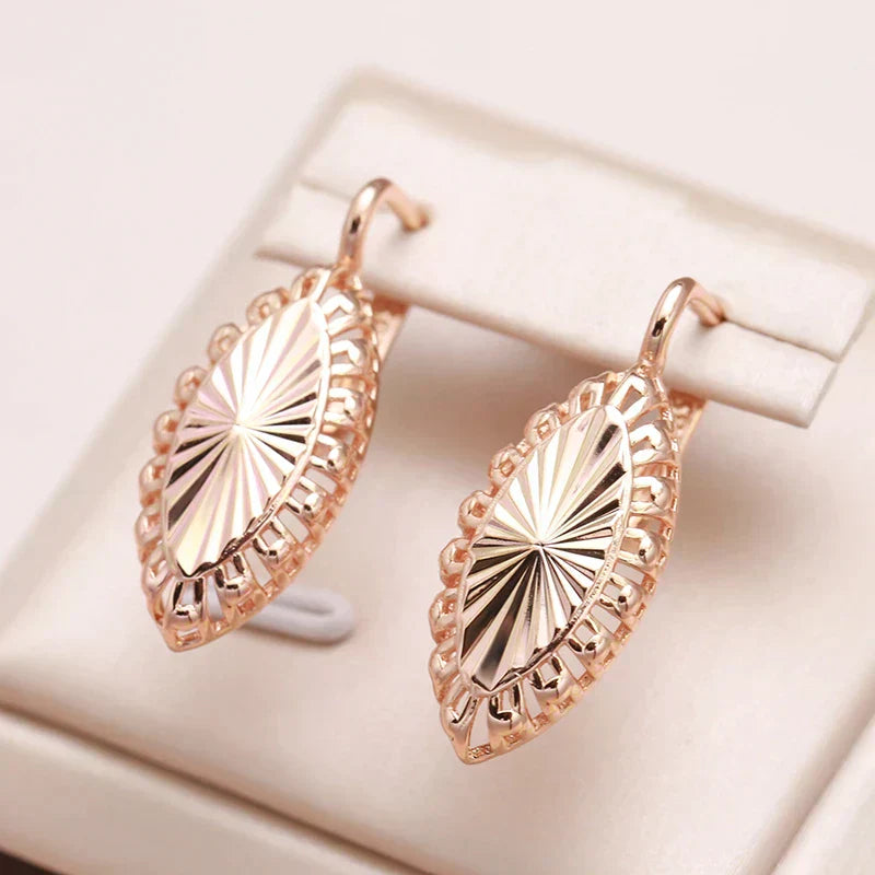 Valeria | Brilliantly shiny golden shield-shaped earrings