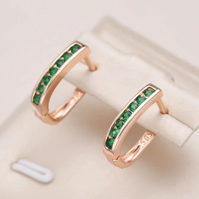 Zoe | Elegant gold earrings with sparkling green crystals