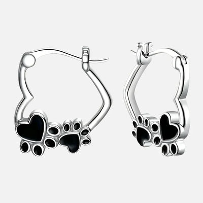 Olga | Silver-effect paw heart hoop earrings with black enamel.