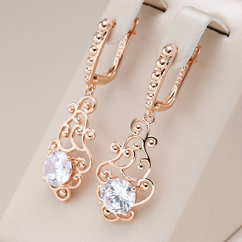 Monica | Elegant gold earrings decorated with sparkling crystals