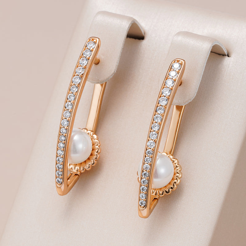 Delia | Glittering earrings with sparkling rhinestones and precious pearls