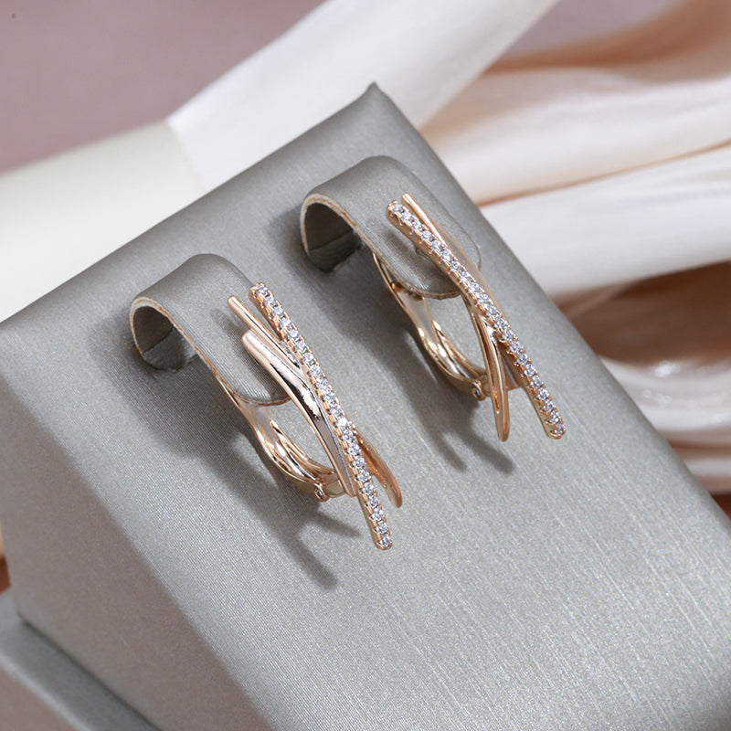 Jenni | Elegant gold earrings with sparkling diamonds in a cross design