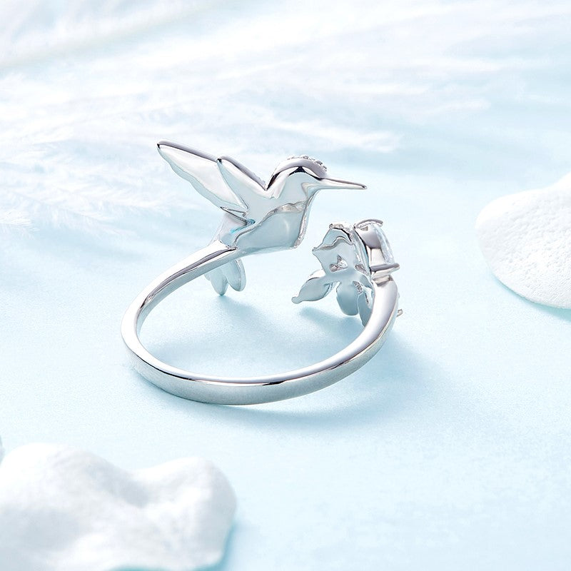 Isabel | LUNAYA – Elegant adjustable glitter ring with enchanting hummingbird and sparkling rhinestone