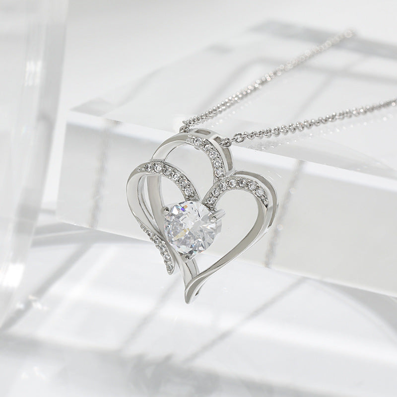 Elena | Necklace with enchanting double heart & sparkling zirconia for a stylish look