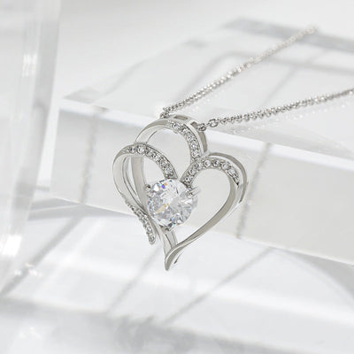 Elena | Necklace with a charming double heart and sparkling zircons.