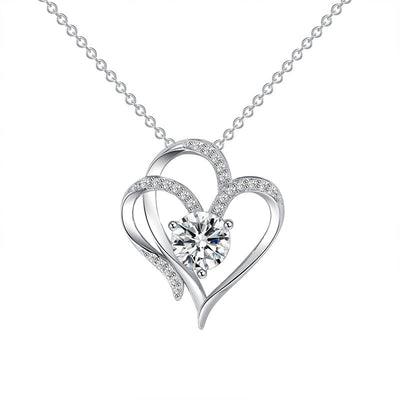 Elena | Necklace with a charming double heart and sparkling zircons.