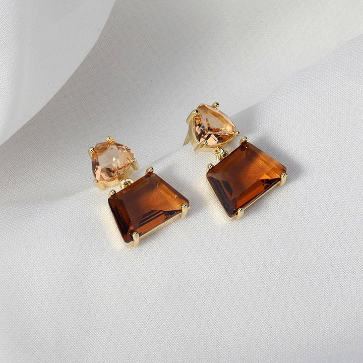 Ruby | Elegant gold earrings with desert crystals