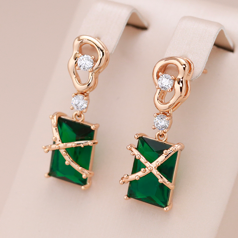 Teodora | Elegant gold earrings with sparkling green crystal