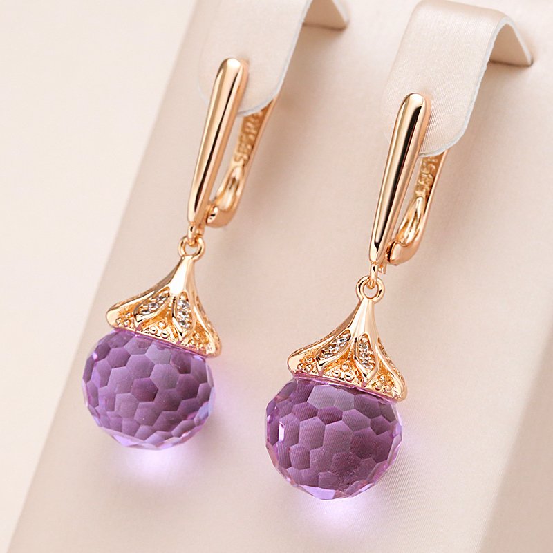 Na la | Fascinating round earrings with radiant purple crystals