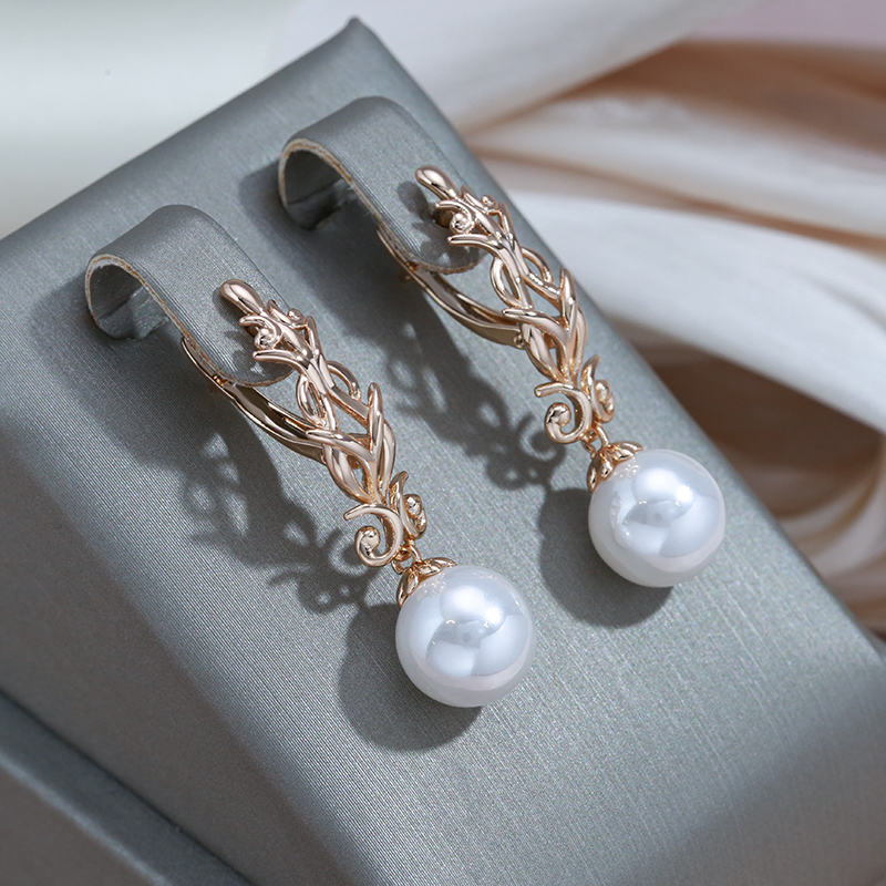 Yesenia | Glamorous earrings made of golden pearls in an enchanted forest style