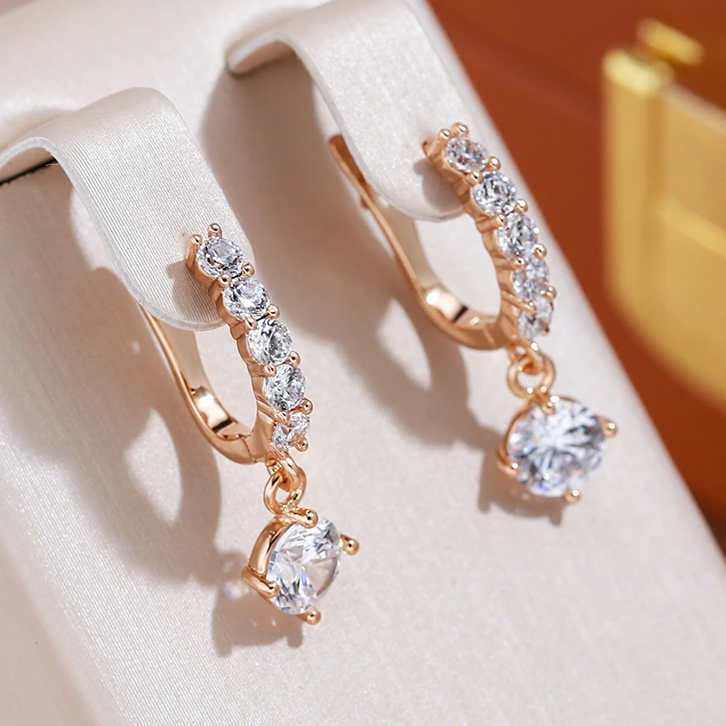 Tatiana | Radiantly elegant earrings made of sparkling white crystal.