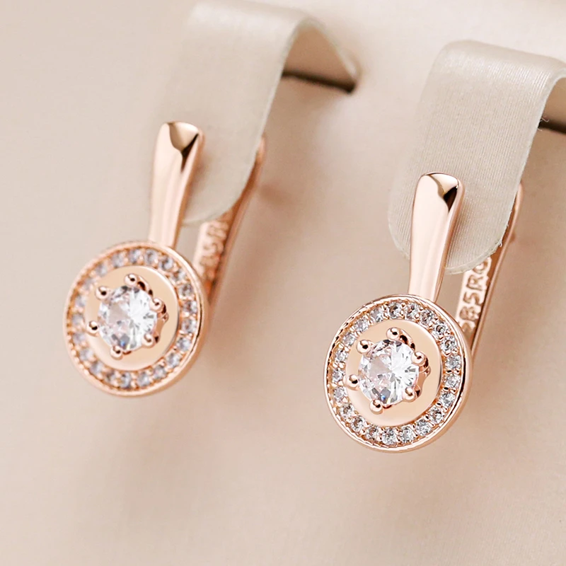Francisca | Exquisite golden stud earrings with radiant white crystal