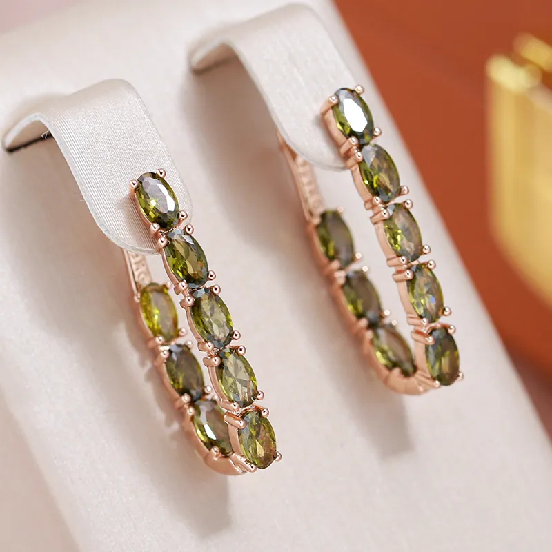 Clarissa | Shiny gold earrings with sparkling crystals