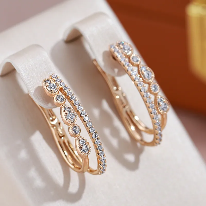 Jimena | Luxurious gold earrings with sparkling zirconia stones