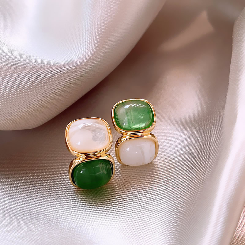 Margarita | Fascinating gold earrings with ornate white and green stones