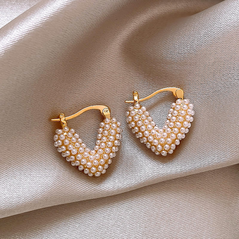 Josefina | Elegant earrings with gold-decorated pearl hearts
