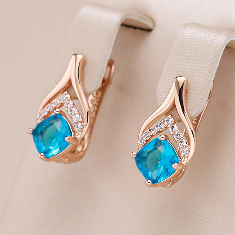 Nelly | Fascinating gold-plated earrings with sparkling blue crystals