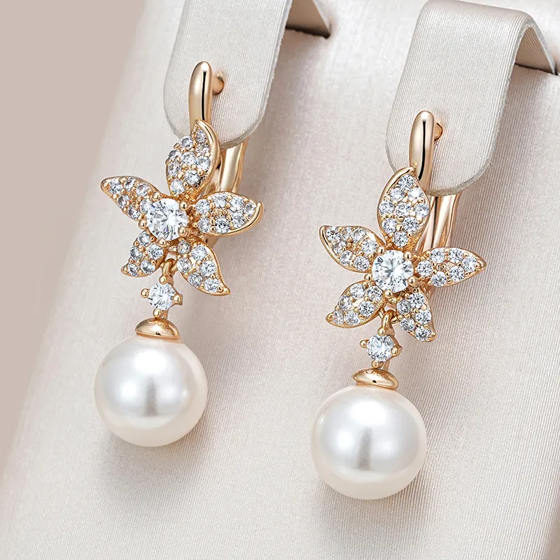 Ofelia | Stylish, pearl-embellished earrings with a shiny finish