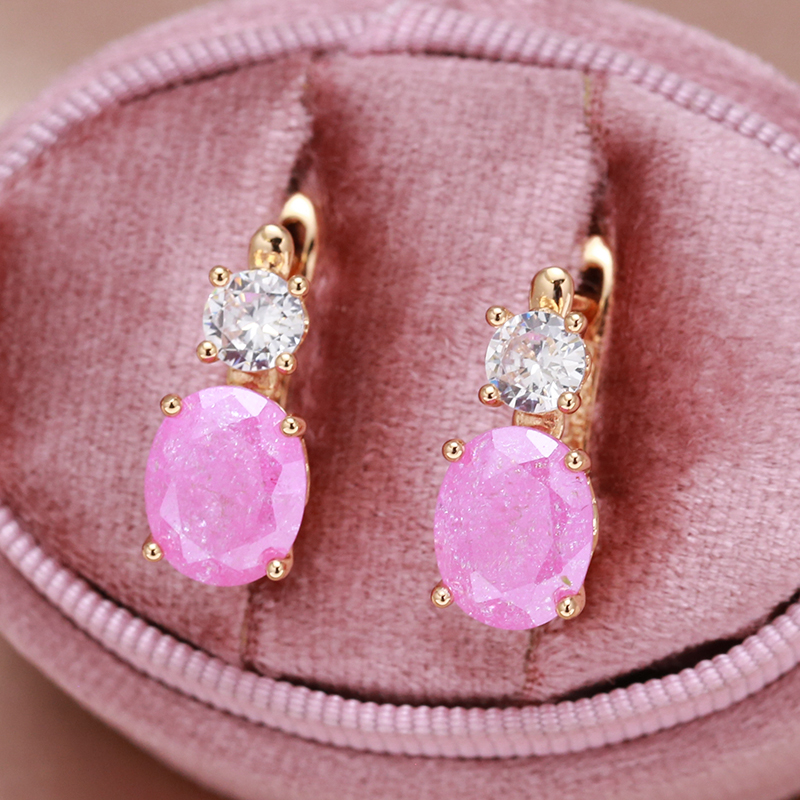 Petra | Beautiful gold earrings with sparkling pink zircons