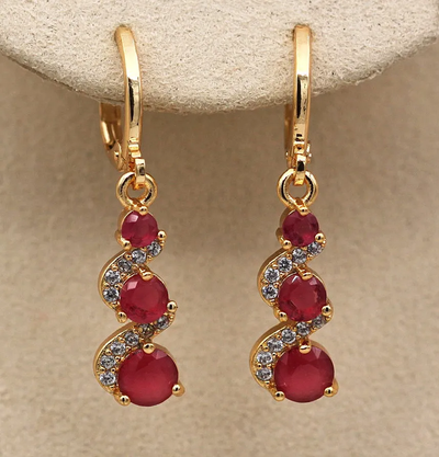 Paulina | Timeless elegance: earrings with sparkling gold zircons