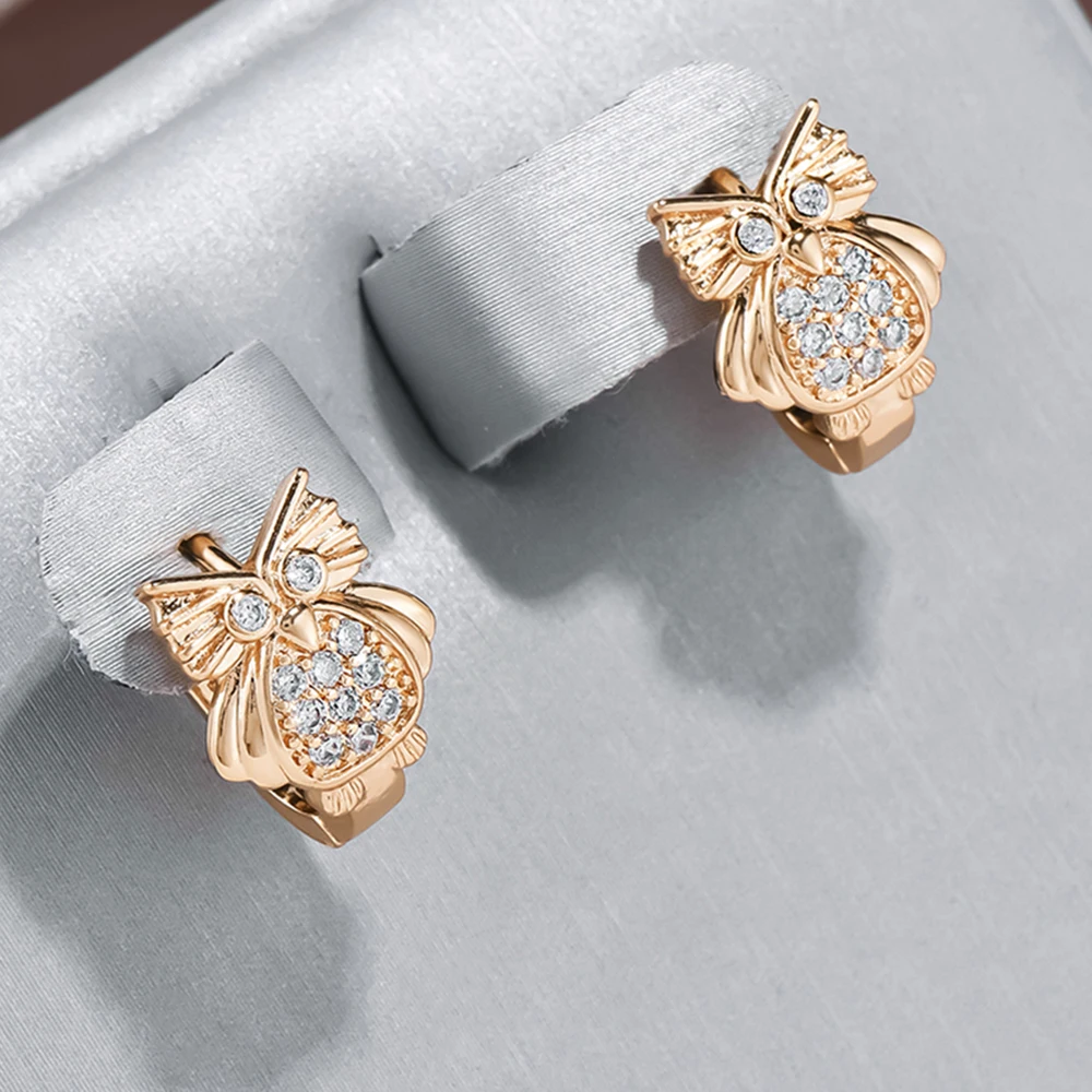 Marta | Elegant sparkly owl earrings.