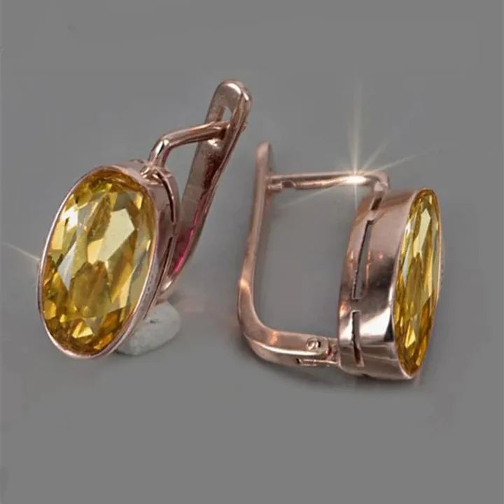 Eugenia | Rose gold earrings with radiant yellow crystals