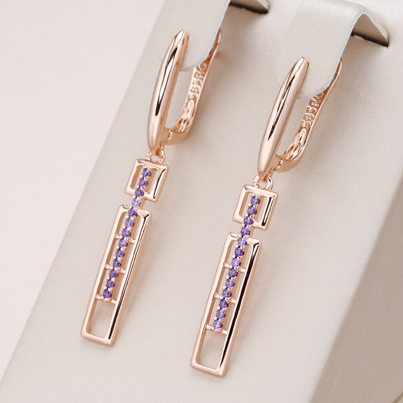 Nahir | Elegant rectangular earrings with sparkling purple crystals in a luxurious gold setting