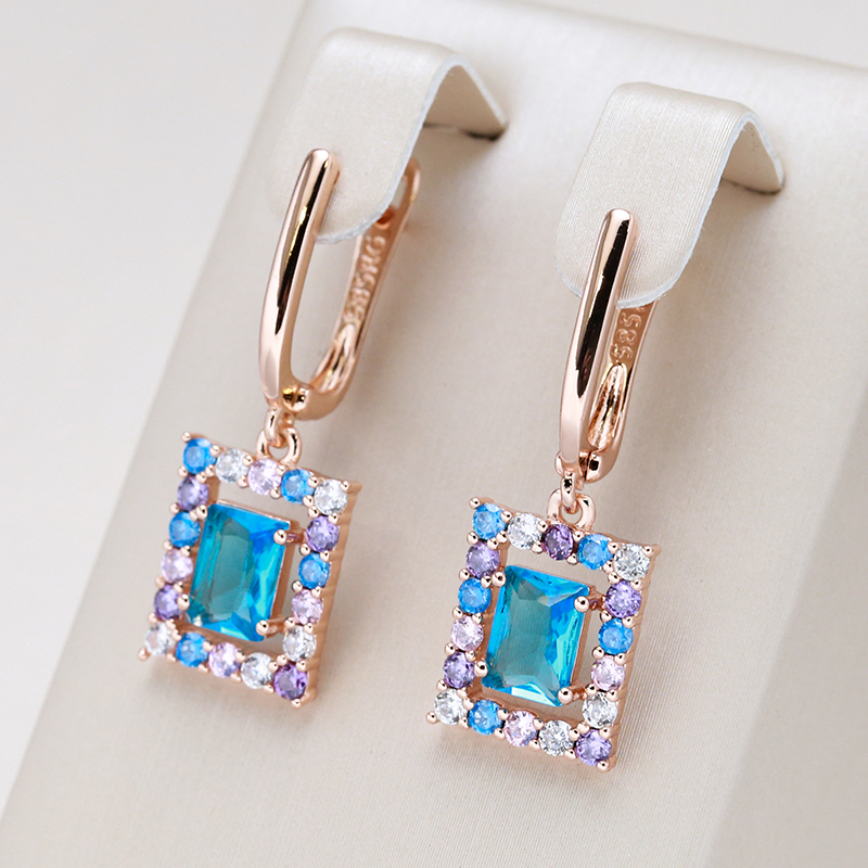 María José | Fascinating gold earrings with radiant blue cubic crystals