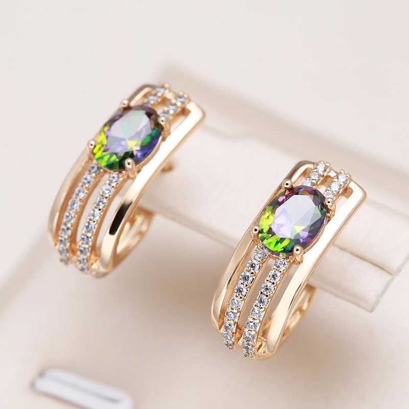Renata | Beautiful golden earrings with sparkling zirconia and a radiant green crystal