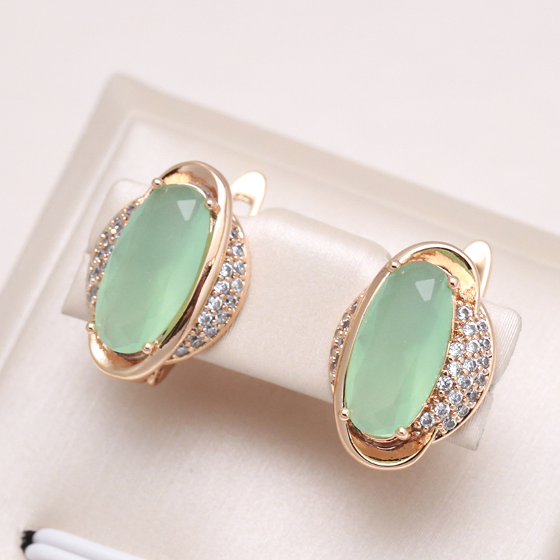Natalia | Stylish gold earrings with green crystals