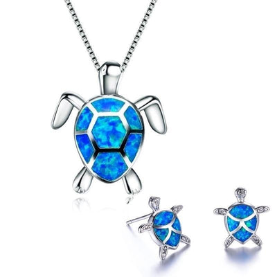 Da Ana | Elegant NAIAE necklace and earring set with a delicate opal sea turtle in silver.