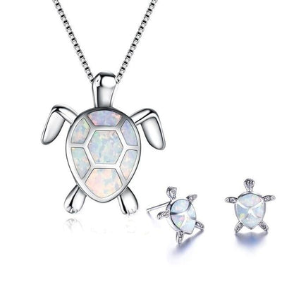 Da Ana | Elegant NAIAE necklace and earring set with a delicate opal sea turtle in silver.