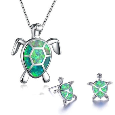 Da Ana | Elegant NAIAE necklace and earring set with a delicate opal sea turtle in silver.