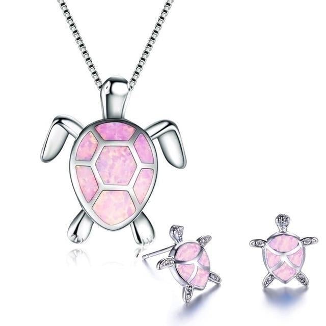 Da Ana | Elegant NAIAE necklace and earring set with a delicate opal sea turtle in silver.